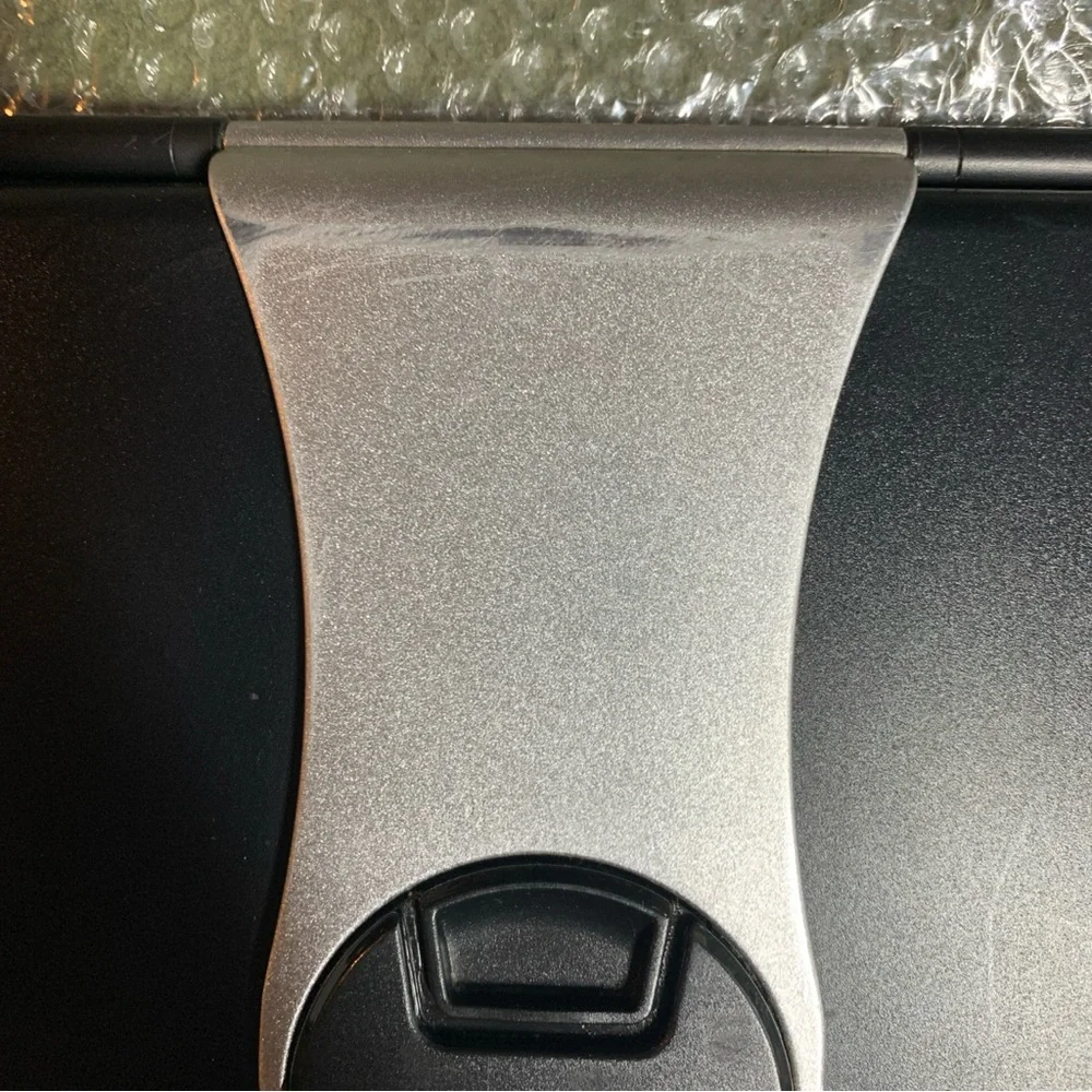 FUC ProCase keyboard case for iPad Pro 12.9”. Black and silver. Charging cord.